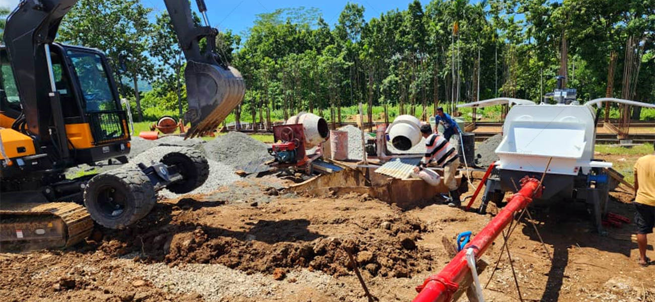 concrete pump on trailer with concrete mixers